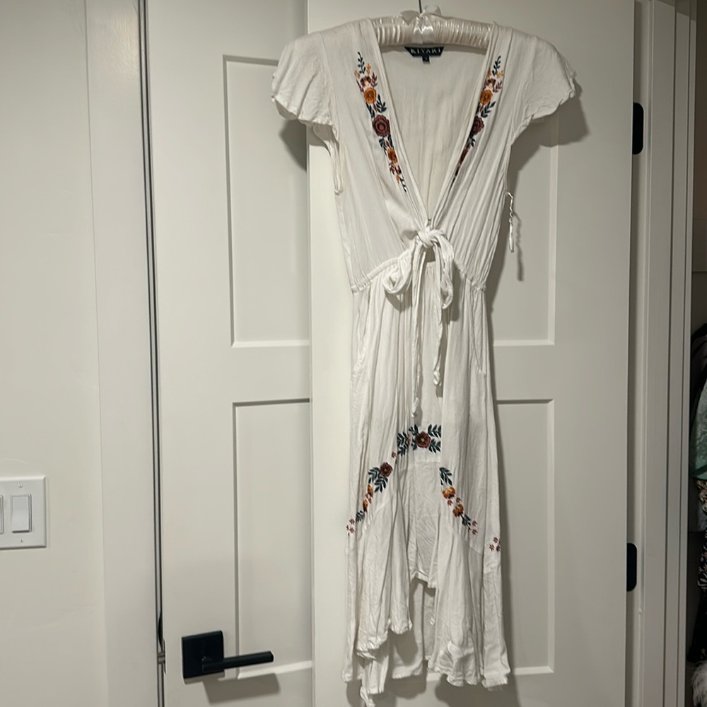 Kivari white dress with floral accents